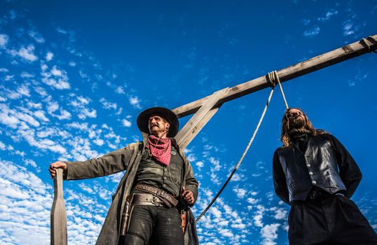 Western Man Awaits Execution of Being Hung From the Neck At Gallows