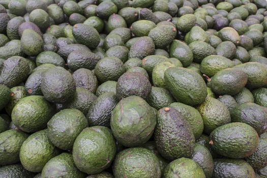 Group of avocados from a super market store.