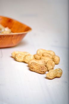 Peanuts in a brown bowl