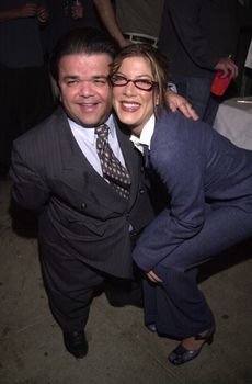 Tori Spelling poses with co-star Gary Friedkin at the "Joe Head Goes Hollywood" Wrap Party, Santa Monica, 12-18-00