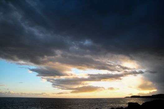 Cloudscape, Colored Clouds at Sunset near the Ocean