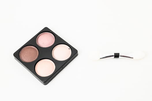 Make-up Palette Of Colorfully Eyeshadows Over White Background