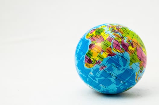 The World Globe Made of Rubber on a White Background