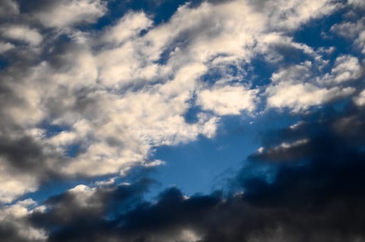 Cloudscape, Colored Clouds at Sunset near the Ocean