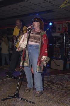 Roseanne performs with her band "Dixx" at Tower Records, Hollywood, 02-21-00