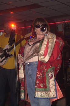 Roseanne performs with her band "Dixx" at Tower Records, Hollywood, 02-21-00