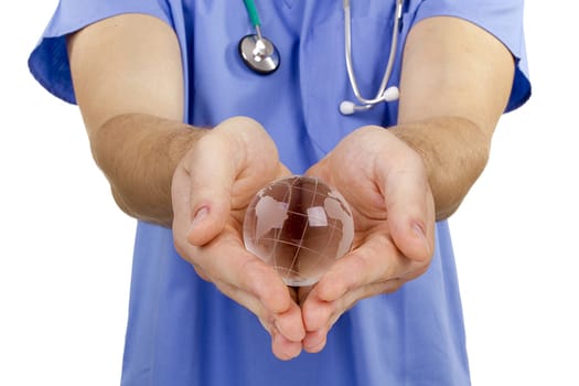 Doctor hand holding a symbolic globe. Global medicine.