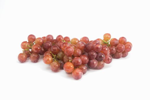 Red grapes fresh with water drops on white background