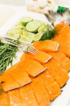 peces of smoked salmon on a buffet