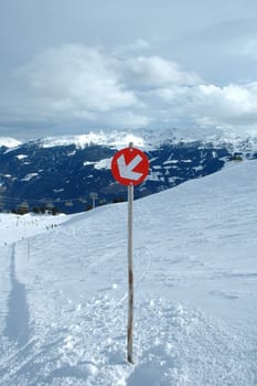 Slope direction sign on the slope in Austria nearby Kaltenbach in Zillertal valley