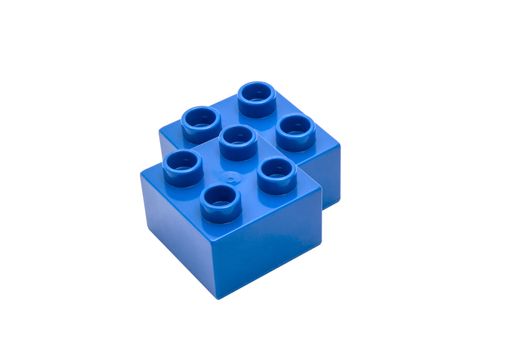 Blue building blocks closeup on white background 