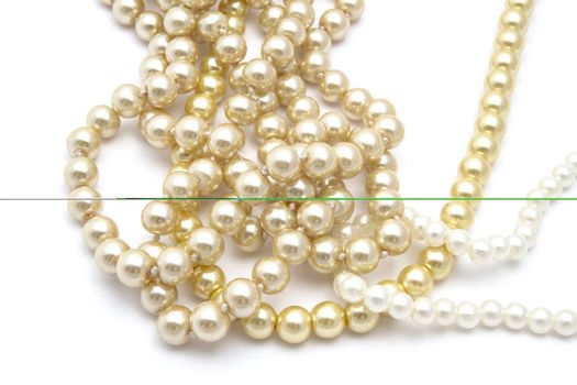 Beautiful string of beads isolated on white background 