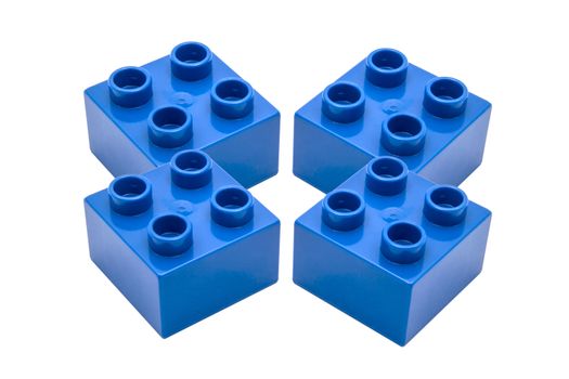 Blue building blocks closeup on white background 