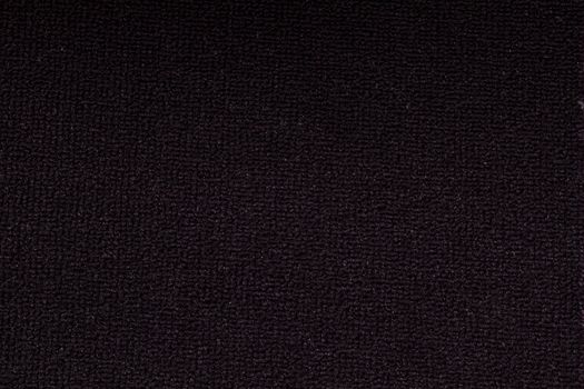 Background of black carpet closeup 
