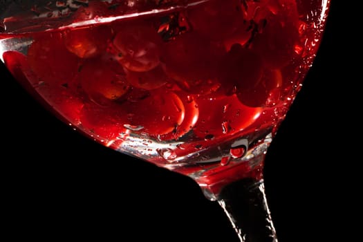 fresh fruit in the water on a black background