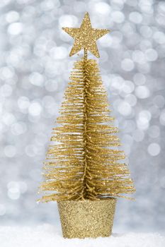 Decorative Christmas tree isolated on bokeh background