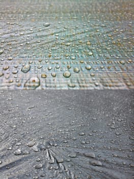 Two abstract background of water drops on a flat surface