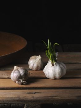 fresh garlic on the old wooden table 
