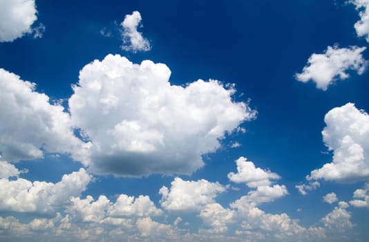 blue sky is covered by white clouds