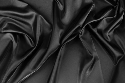 Closeup of rippled black silk fabric