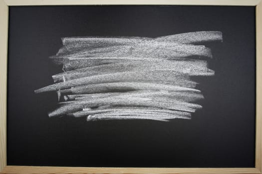 Rubbed out chalk on blackboard 