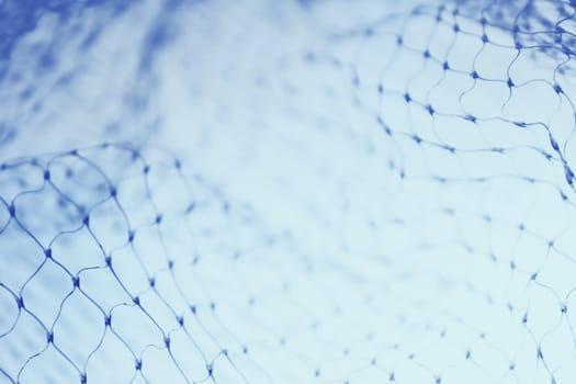 Closeup of abstract blue fishnet