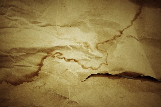 Closeup of brown wrinkled paper texture background