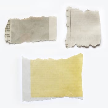 Three pieces of torn paper isolated on plain background