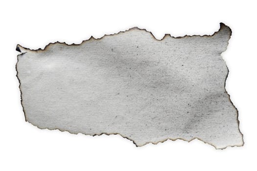 Burnt piece of paper on plain background 