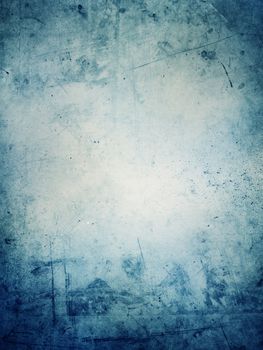 Blue grunge textured wall closeup