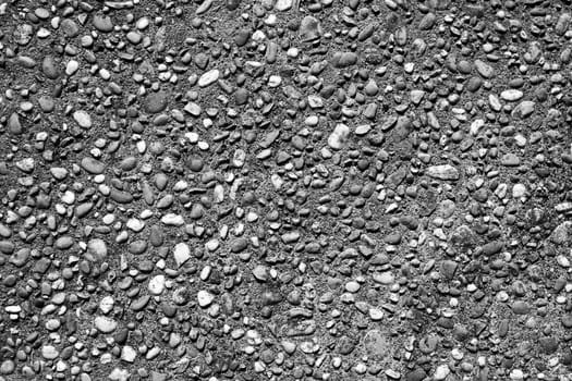 Closeup of textured pebbles background 