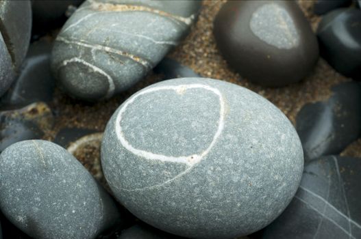 Stripped pebbles at a beach of Devon