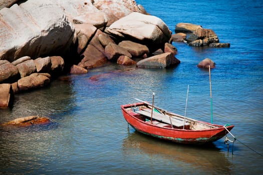 Red small Boat on coast, Hong Kong