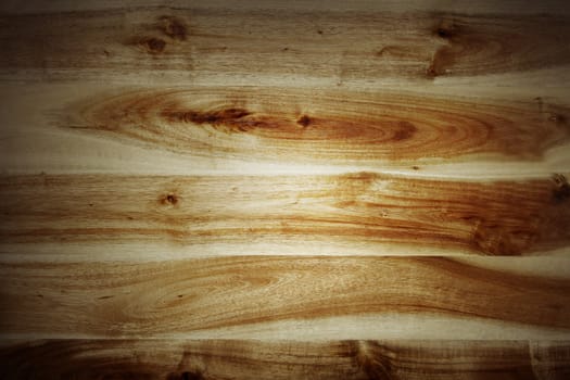 Closeup of wooden surface, dark edges