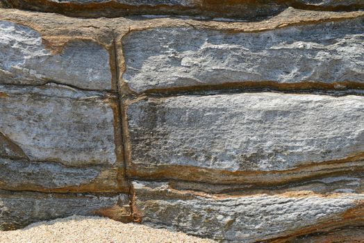 beautiful pattern and texture in Stone at the coast 
