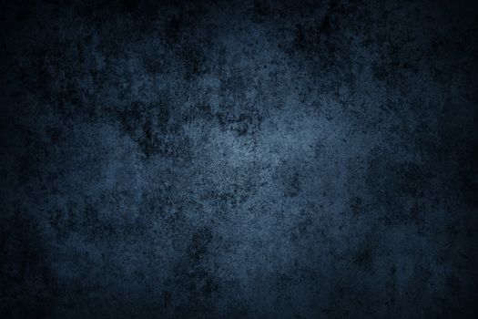 Blue grunge textured wall closeup