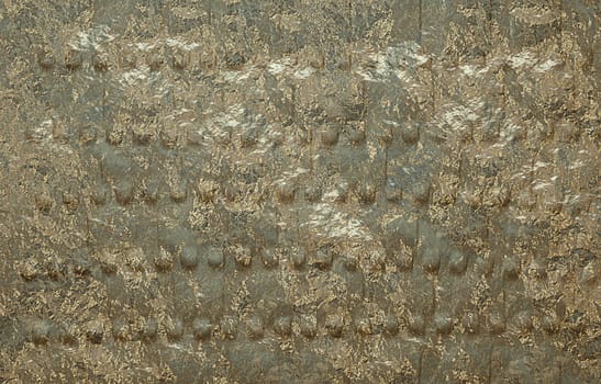 A wall painted of gold, realistic gold texture.