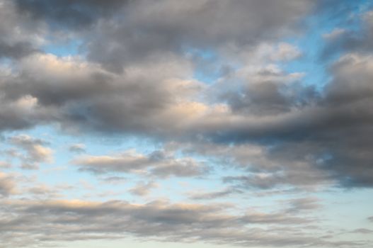 Cloudscape, Colored Clouds at Sunset near the Ocean