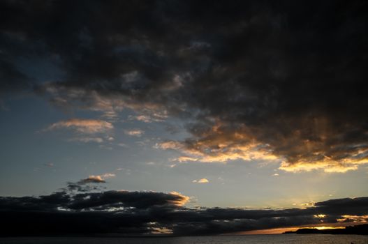 Cloudscape, Colored Clouds at Sunset near the Ocean