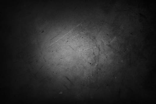 Dark grunge textured wall closeup