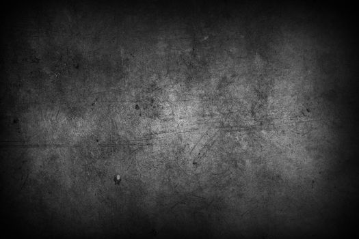 Dark grunge textured wall closeup