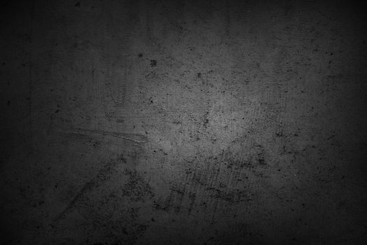 Dark grunge textured wall closeup