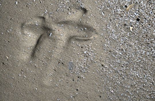 Crosses carved in the sand from water wave made in 3d software