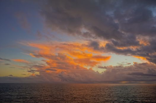 HDR Colred Sunrise Clouds over the Atlantic Ocean in Tenerife Canary Islands