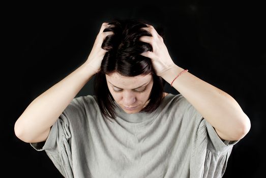 conceptual portrait of stressed abused young woman 