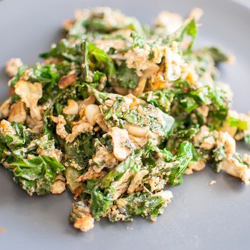 healthy fresh green kale with scrambled eggs