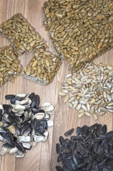 peeled sunflower seeds, whole and in their skins, seeds sweets, kozinaki