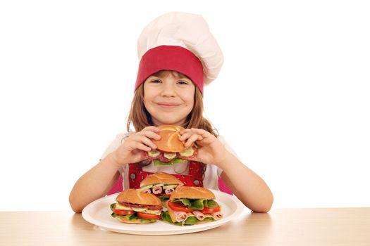 happy little girl cook eat sandwich 