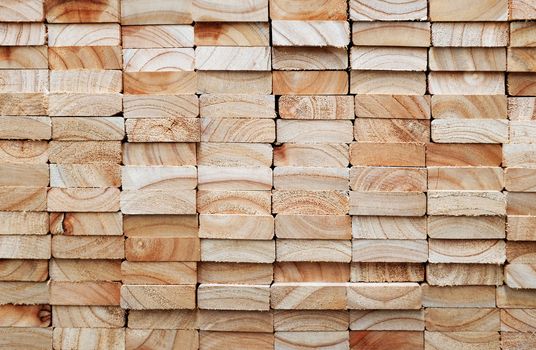 Stack of square wood planks for building materials
