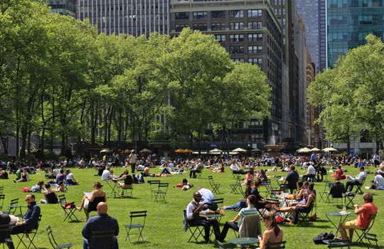 NEW YORK, USA - MAY 16: People enjoying a nice day in Bryant Park on May 16, 2013 in New York City, NY. Bryant Park is a 9,603 acre privately managed park in the center of Manhattan.